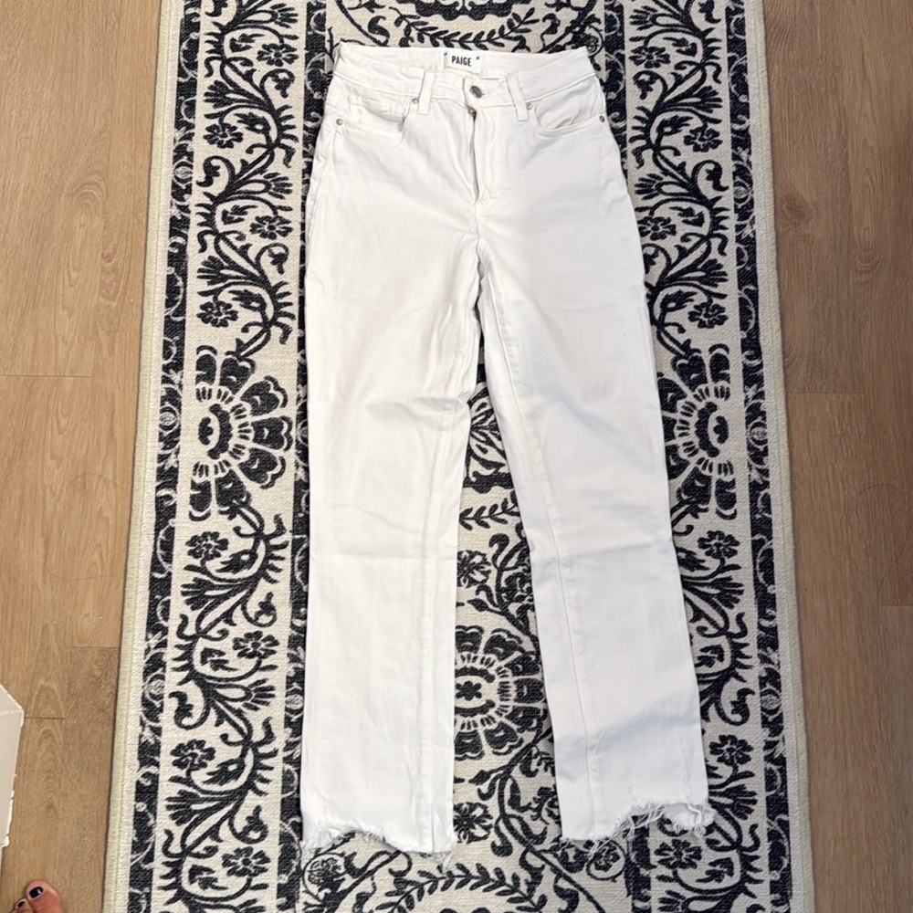 Paige white straight leg denim with distressed bottom